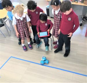 Stratford School kindergarteners show off their coding skills by programming the Dash robot