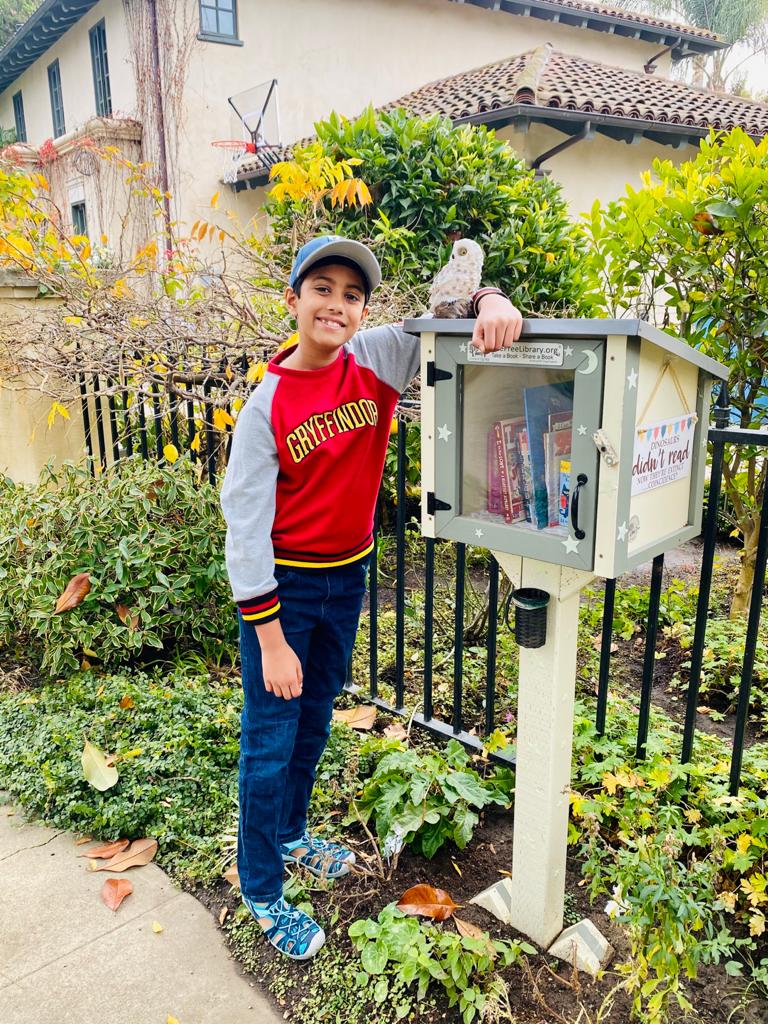 Arjun with his first Freel Little Library