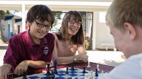 Stratford; High School; Middle School; Accessories; Accessory; Chess; Game; Glasses; Human; Person;